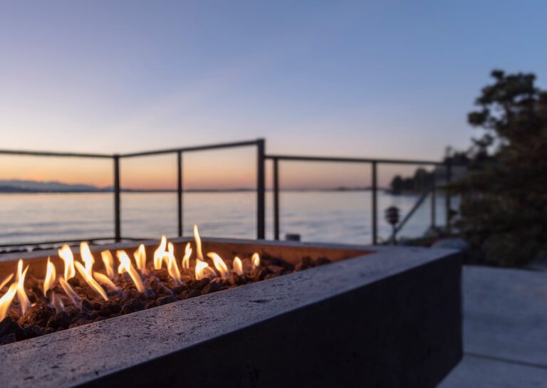 backyard golden hour sunset gas lit fire pit by wa FW5ABHW | Design & Installation Services