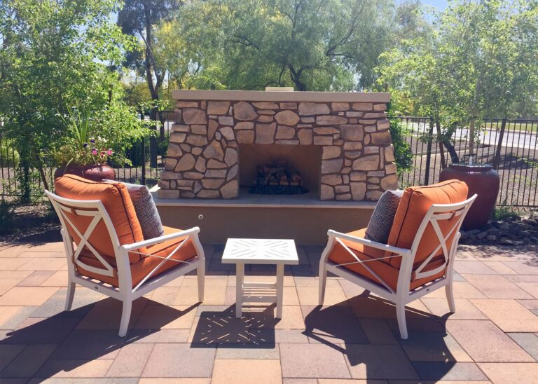 outdoor fireplace and chairs on a patio MSL2NJL 5X7 | Design & Installation Services